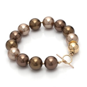 צמיד פניני מיורקה גדולים בגוונים חומים וזהובים